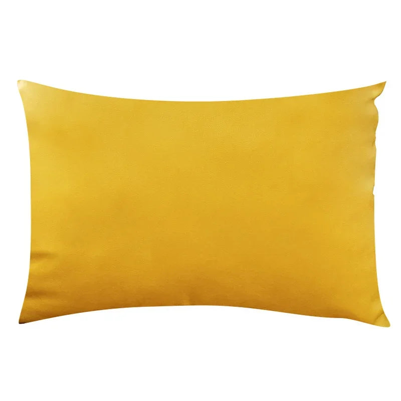 A solid golden yellow velvet throw pillow cover.