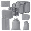 A set of nine gray mesh storage organizers and pouches for portable organization.