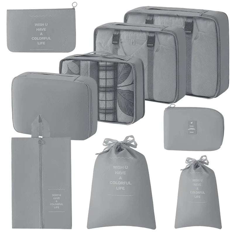 A set of nine gray mesh storage organizers and pouches for portable organization.