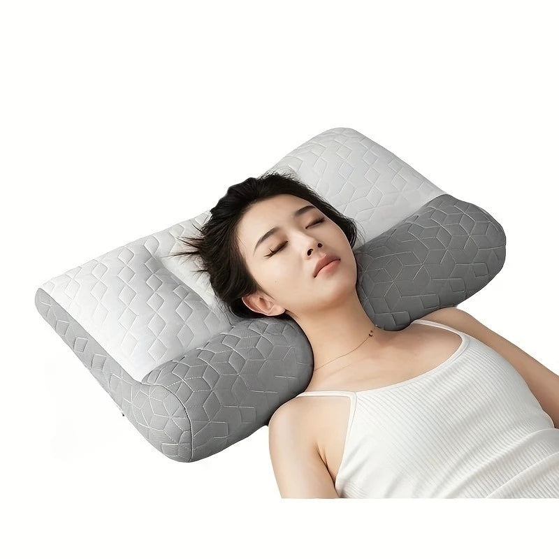 A woman rests her head on a gray 3D ergonomic contour pillow for neck and spine support.