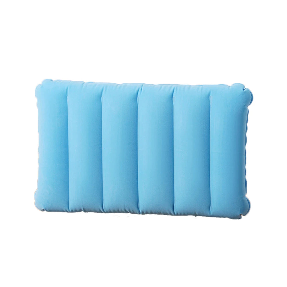A light blue portable inflatable travel pillow with ribbed texture.