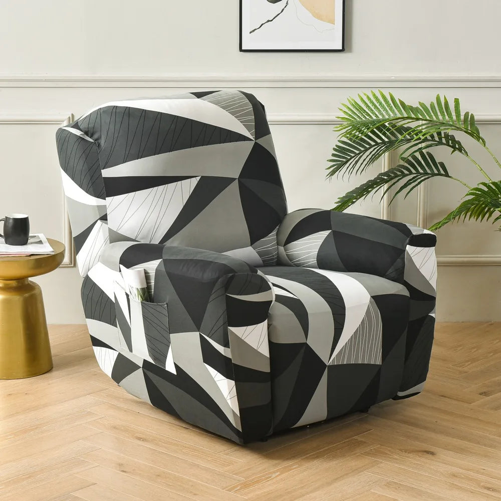 A modern, upholstered armchair with a geometric black and white pattern sits on a light wood floor next to a potted green pla