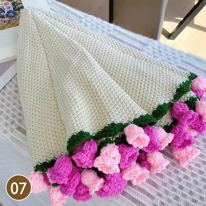 Hand knitted floral rose bouquet throw blanket in cream color with pink and green roses
