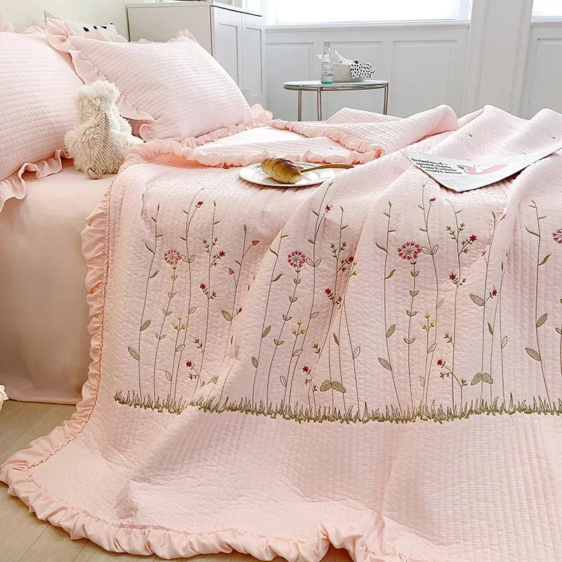 Pink floral embroidery quilt bedspread set with white fluffy pillow and light pink bedding