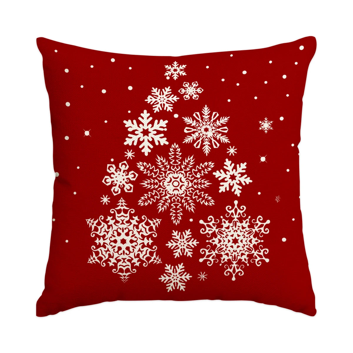 A deep red pillow featuring a white snowflake pattern.