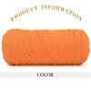 A skein of thick orange polyester blended yarn is shown rolled up for crafting.