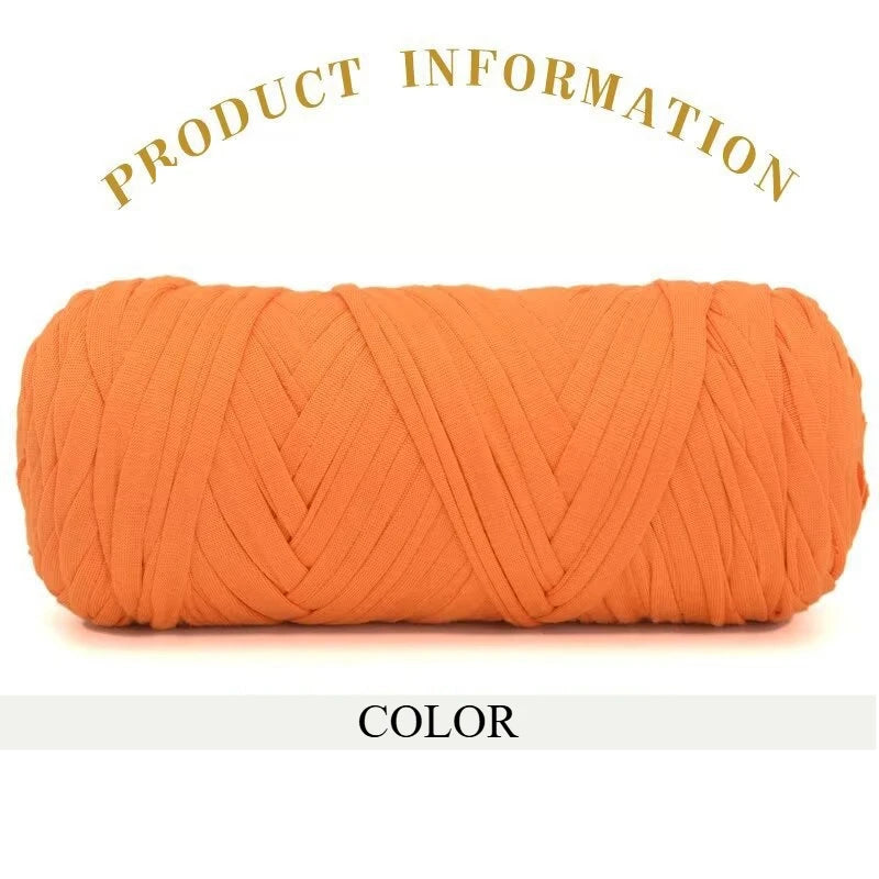 A skein of thick orange polyester blended yarn is shown rolled up for crafting.