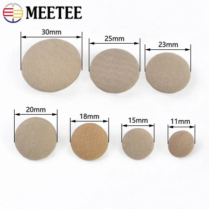 A set of round fabric-covered shank buttons in various sizes, ranging from 11mm to 30mm.