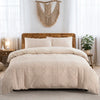A beige boho tufted microfiber duvet cover set displayed on a bed with sheer curtains and a macrame wall hanging.