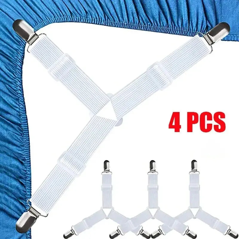 Four white adjustable bed sheet holder clips attached to a blue fabric, showing the product in an X-shape.