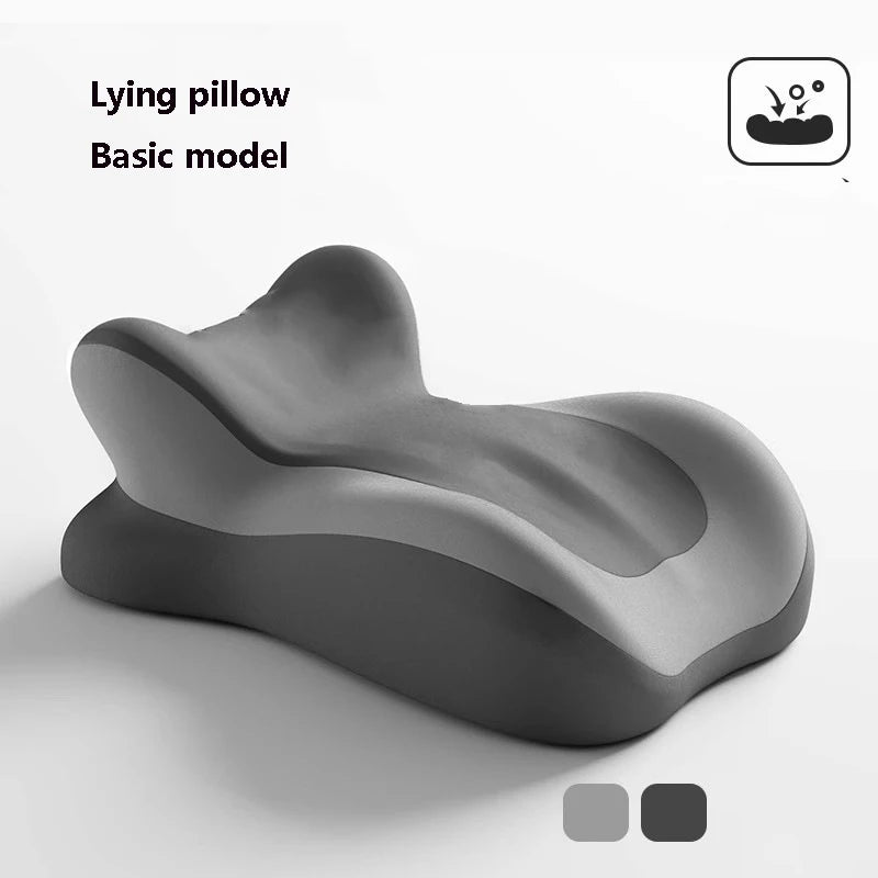 A gray lying pillow with an ergonomic wedge shape shown from above.