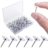 A clear plastic box containing a pack of round head push pins with metal points.