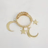 Gold braided curtain clips featuring a star and crescent moon design
