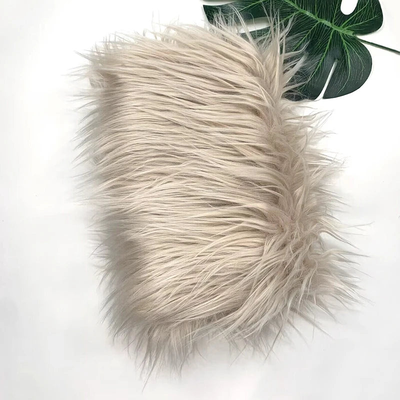 Light beige faux fur plush fabric used for sewing and crafting
