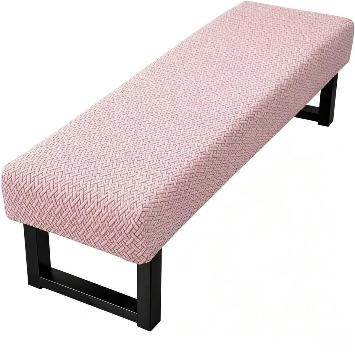 A pink jacquard stretch bench cover with a woven pattern and black frame.