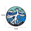 Metal brooch pin featuring Ho-Oh and Lugia designs on a circular background