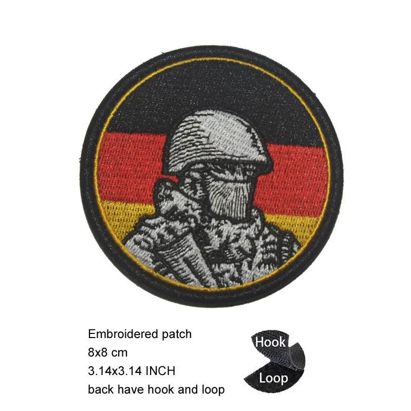 Embroidered patch featuring a German flag background with an eagle silhouette.