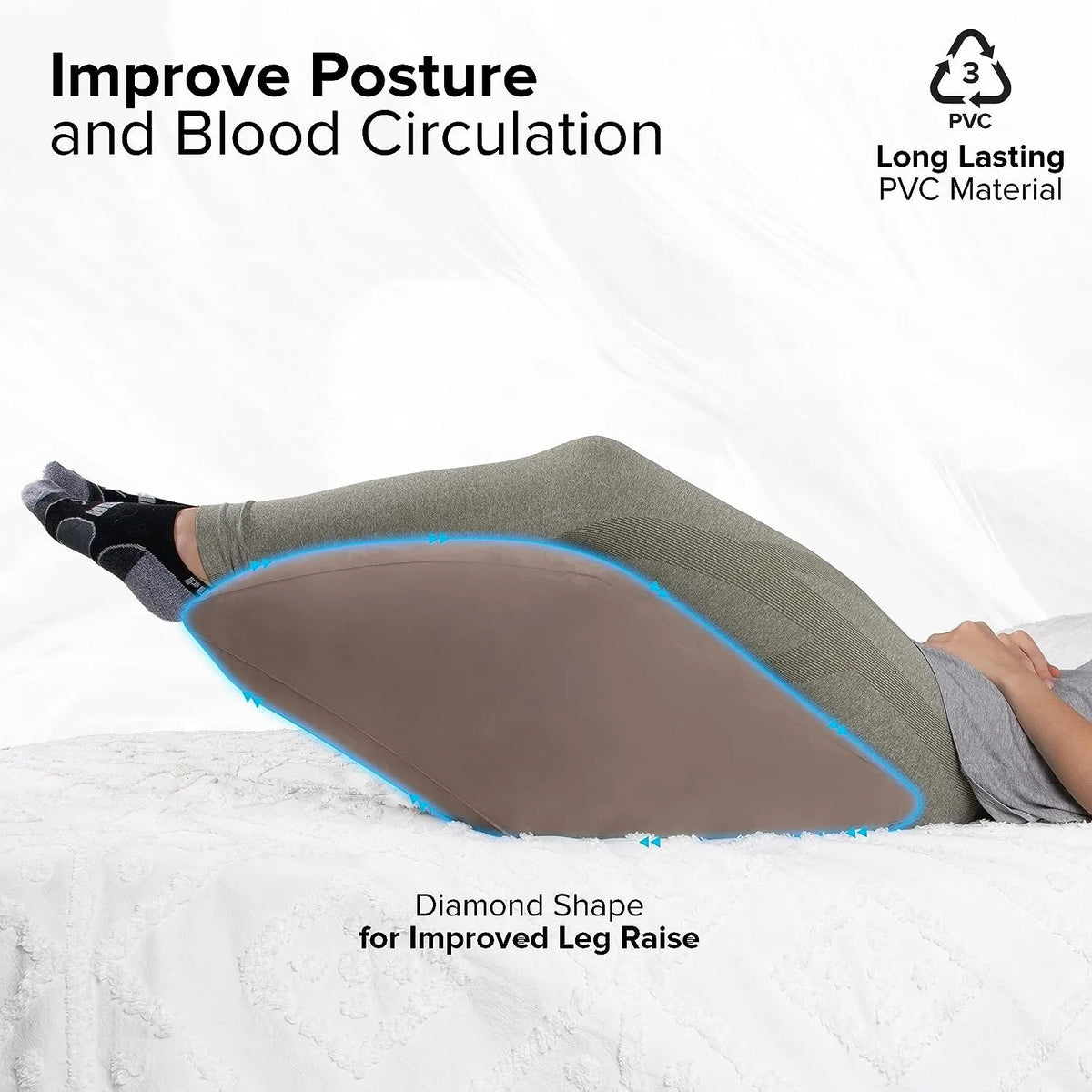 A diamond-shaped silicone leg elevation pillow is shown placed on a person's leg for improved posture and blood circulation.