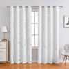 White marble printed curtain panels hanging in a window frame