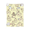 A yellow flannel throw blanket featuring a pattern of cute Chiikawa cartoon characters.