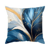 Abstract leaf cushion pillow covers featuring blue and white brushstroke design with gold accents