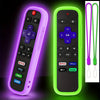 A pair of glow-in-the-dark silicone remote covers, one purple and one green, showing various media buttons.