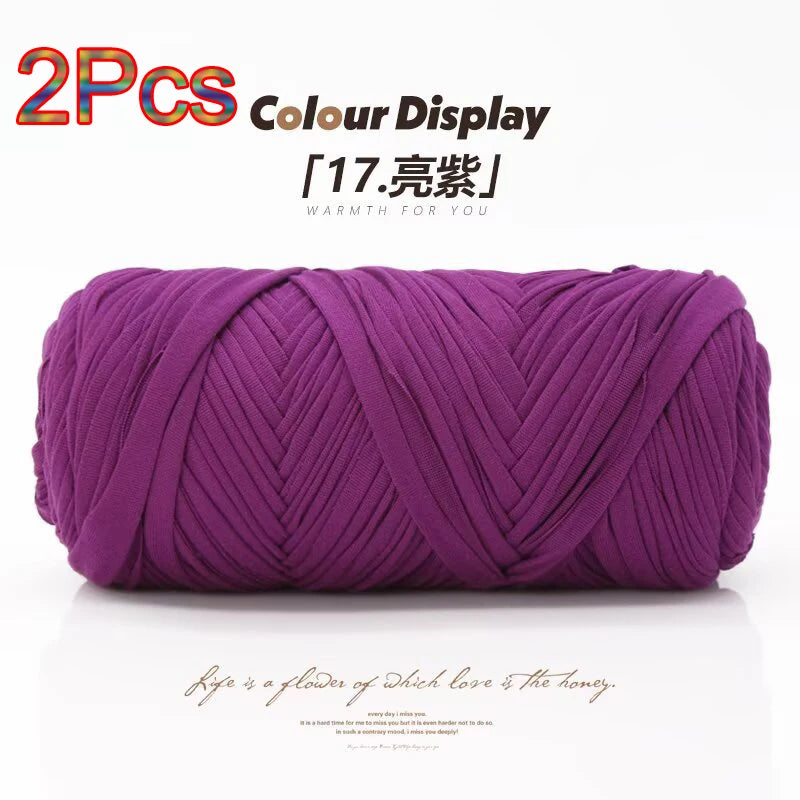 A purple reusable elastic yarn skein displayed against a white background.