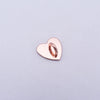 A small, rose gold heart-shaped metal charm used as a phone accessory or connector.