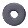 A round, gray ear piercing pillow designed for comfort during sleep.