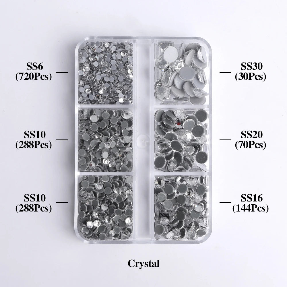 A clear plastic container holds various sizes of silver glass rhinestones categorized by SS6, SS10, SS10, SS30, SS20, and SS1