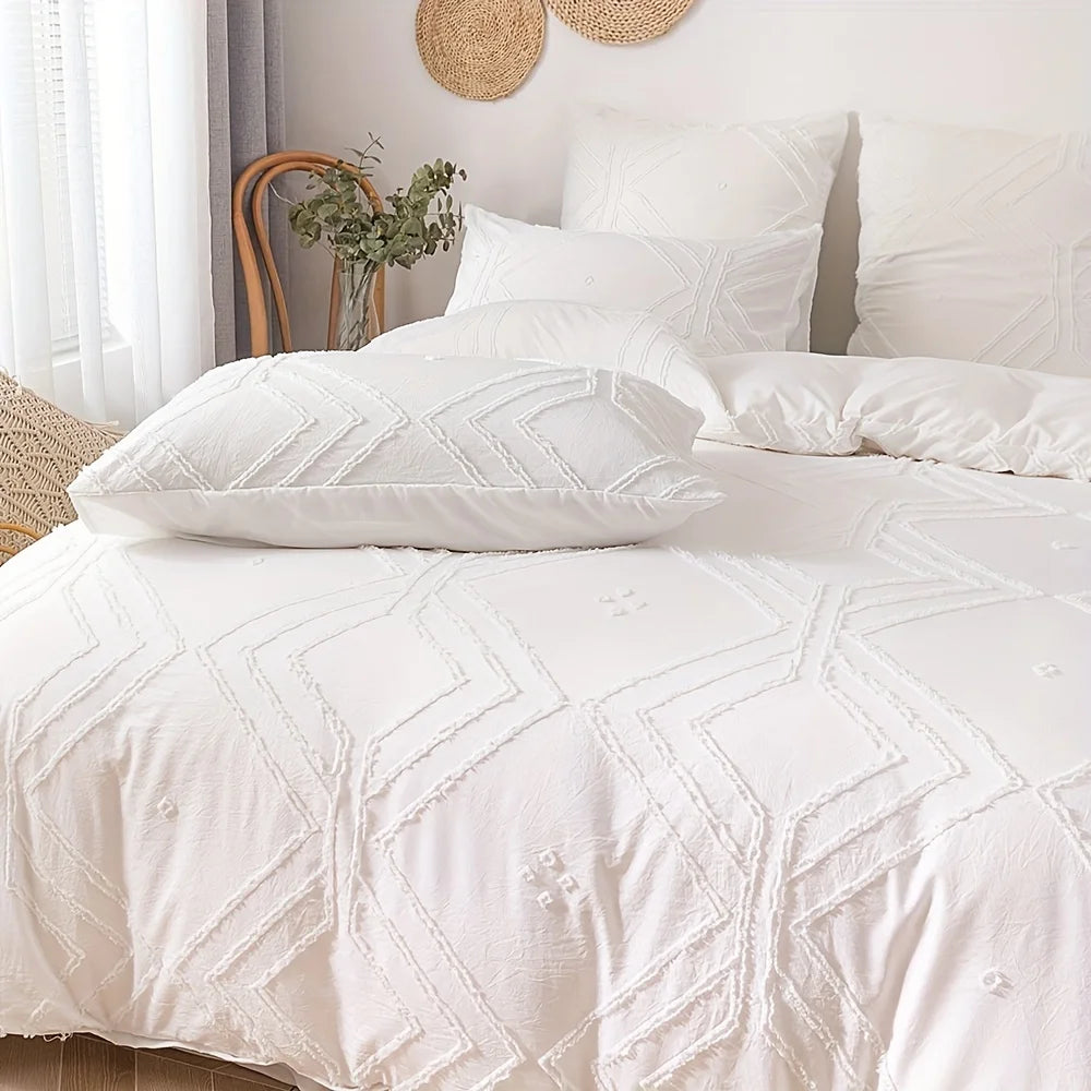 White bohemian grid tufted duvet cover set on a bed with natural light and woven accents
