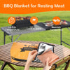 An orange insulated bag for BBQ meat used as a blanket to maintain tenderness while resting on a wooden table.