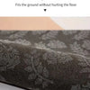 Close-up view of a dark patterned foot mat showing the non-slip bottom texture.