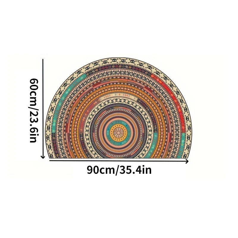 A half-round boho non-slip area rug featuring concentric circular patterns in earthy tones of orange, brown, and teal.