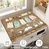 Vintage laundry appliance cover for protection shown on a washing machine, refrigerator, and table.