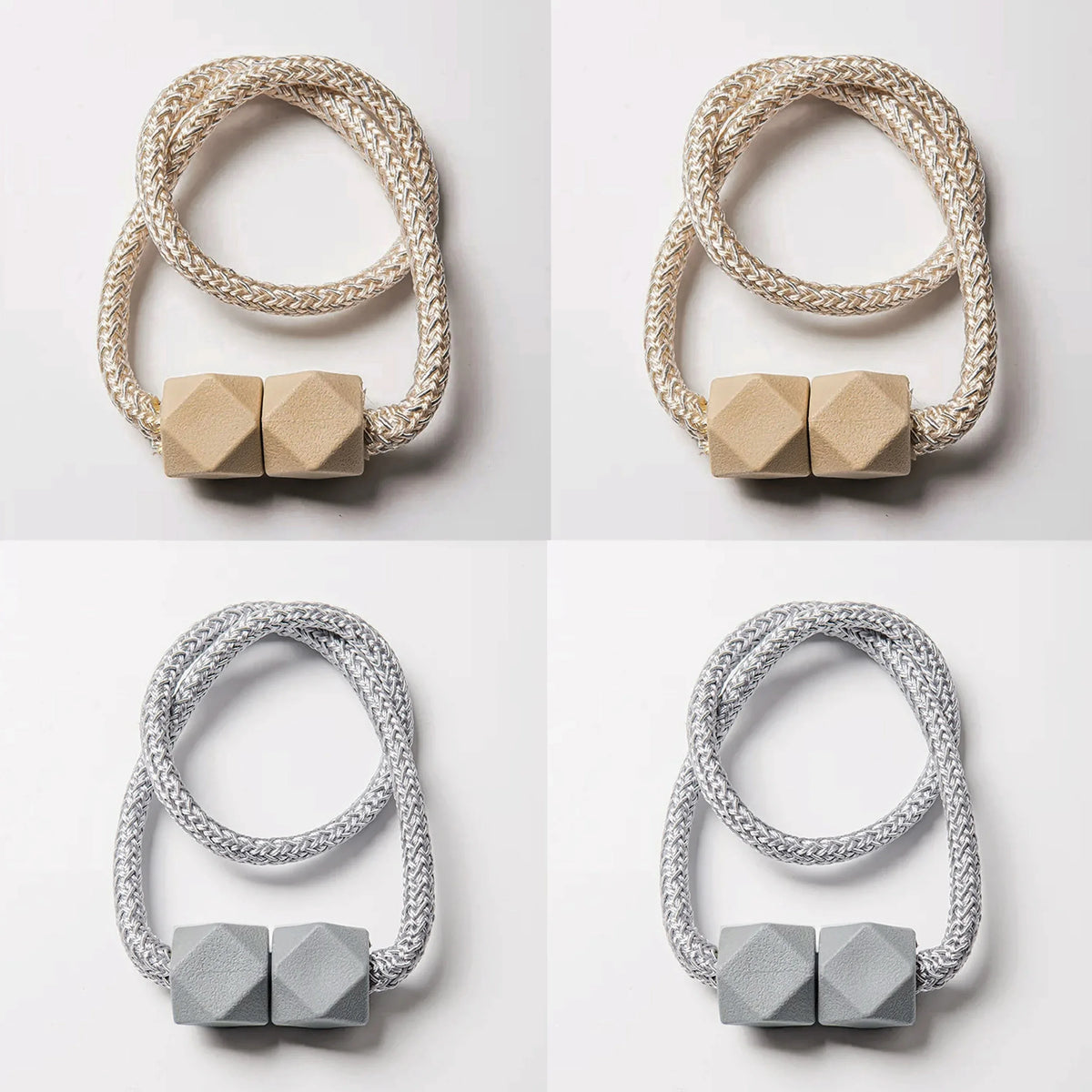 A set of four beige and silver magnetic curtain tiebacks, featuring textured rope designs.