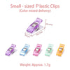 Small plastic sewing clips in various colors including purple, blue, pink, green, and yellow.