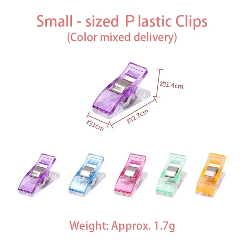 Small plastic sewing clips in various colors including purple, blue, pink, green, and yellow.