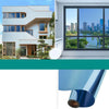 A close-up view of a rolled blue insulated glass film for window privacy and sun protection.