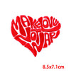 Red heart shape embroidered patch with the text Make Love Jot Jar