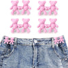 Set of pink bear button pins attached to a denim jean fabric