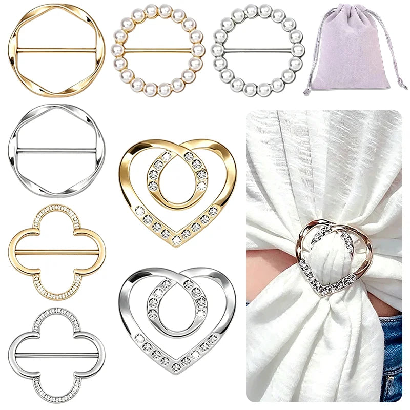 A collection of round heart button clips in gold and silver tones for clothing and accessories.