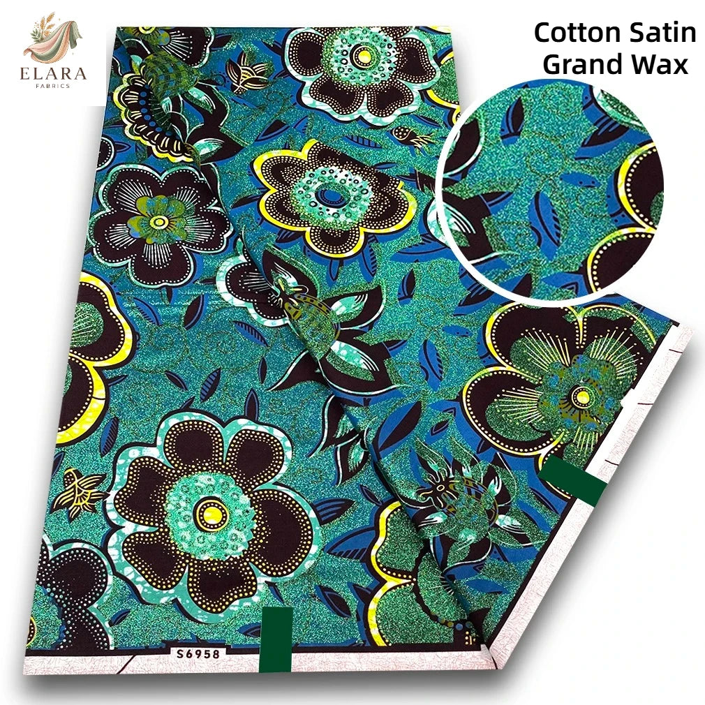 Cotton satin grand wax fabric featuring a vibrant teal and black floral pattern
