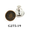 A round brass button pin with engraved text and a silver post, labeled G275-19.