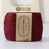 A ball of deep red bamboo fiber yarn used for crafting.