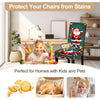 A child is sitting on a chair covered with a Santa Claus pattern stretch cover in a living room setting.