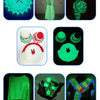 A collection of glow-in-the-dark yarn items including a clock, a knitted dress, and various crochet patterns.