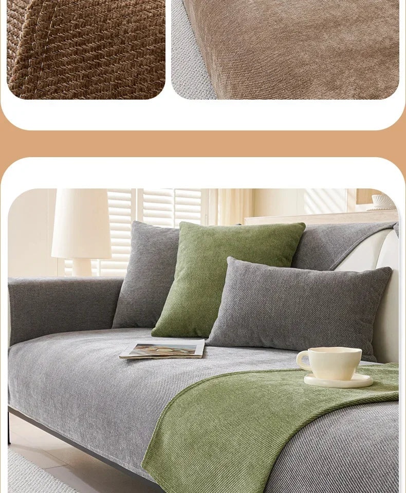 A sofa is covered with a gray fabric and accented by olive green pillows and a matching throw.