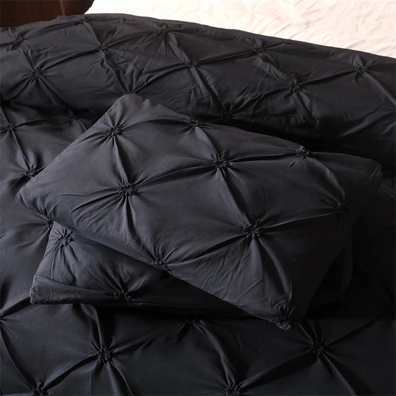 Black quilted comforter and pillow set for queen size bedding