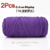 Two purple elastic yarn skeins displayed for crafting